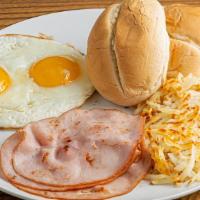 Classic Breakfast · Eggs any style, choice of bacon, ham or sausage. Hash browns, bread or corn tortilla.