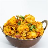 Shrimp Biryani · Shrimp cooked with basmati rice with special herbs and spices.