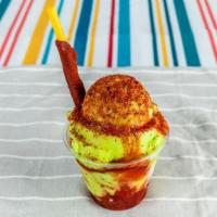 Mangonadas · Freshly prepared with chamoy, lime, tajin and a tamarind candy stick.
