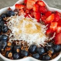 Selfie Bowl · Base: acai, banana, mango, pineapple coconut milk toppings: gf/ vegan granola, strawberry, b...