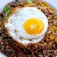 Kate’S Veggie Breakfast Quinoa Bowl · Quinoa, with sautéed broccoli, mushrooms melted cheddar cheese topped with a sunny side.