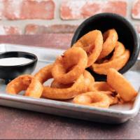 Homemade Beer Battered Onion Rings · Served with ranch dipping sauce.