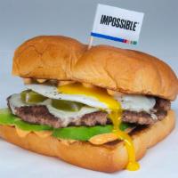  Chipotle Avocado Burger · White American cheese, avocado, pickled jalapenos, cotija cheese, fried egg, and Chipotle ai...
