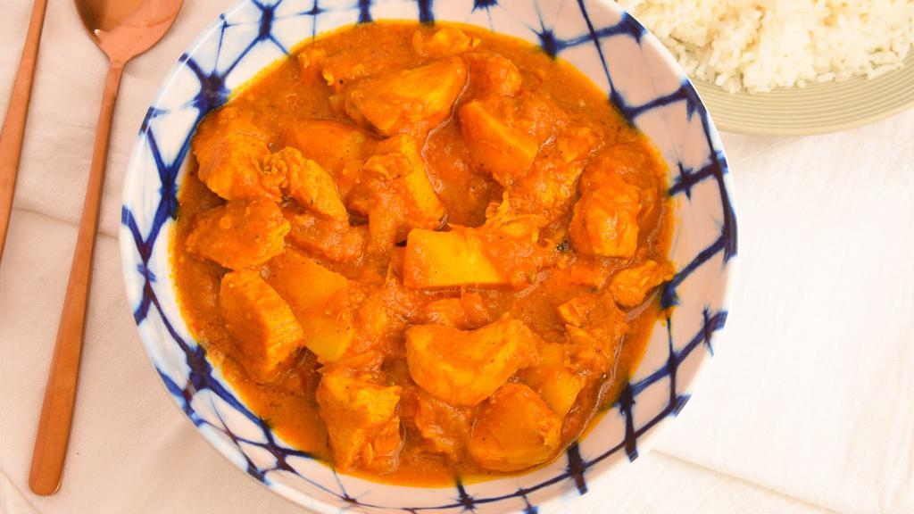 Chicken Vindaloo · Boneless chicken, potato, onion, and tomato gravy cooked in Himalayan herbs and spices, vinegar, and Vindaloo sauce.
