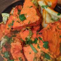 Paneer Tikka Tandoori · Home made cheese marinated in sour cream and Himalayan herbs and spices with onion, red bell...