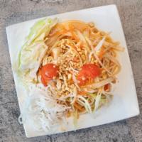 Papaya Salad · Papaya mixed with chili, tomatoes, garlic, and lime juice. Served with cabbage and vermicell...