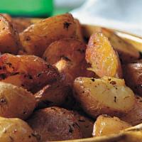 Roasted Potatoes · With rosemary, garlic and extra virgin olive oil.