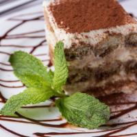 Tiramisu · Layers of lady finger cookies soaked in espresso coffee with a mascarpone cream. Dusted with...