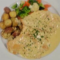 Chicken Dijon · Pan-roasted chicken breast topped with a tangy dijon mustard cream sauce served with carrots...