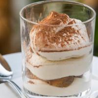 Tiramisu · Coffee soaked ladyfingers, layered with creamy mascarpone cheese & chocolate.