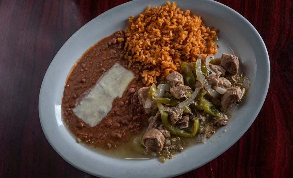 Chile Verde · Braised pork with bell pepper, tomatillo, onion and tortillas.