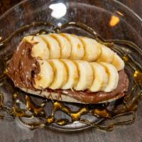 Funky Monkey · Nutella, bananas, drizzled with honey and sprinkle of cinnamon on a toasted whole wheat waln...