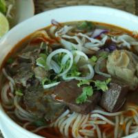 Bun Bo Hue · Hue region style spicy beef thick noodle soup. Selection of our popular noodle soup.