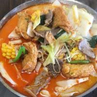 Beef (Spicy) · Lotus , napa cabbage, enoki mushroom, corn, tofu, fish cake