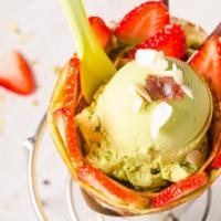 Matcha Azuki Bean Crepe · Sliced strawberries, red bean, matcha custard cream, whipped yogurt, matcha ice cream (gelat...