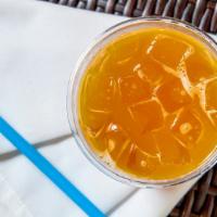 Mango Green Tea · With mango cubes (iced only).