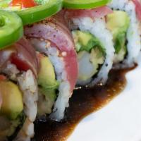 Naughty Ninja Roll  · shrimp tempura, spicy imitation crab, avocado & cilantro roll topped with seared pepper tuna...