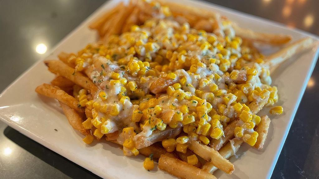 Corn Cheese Fries · Crispy fries with melted mozzarella cheese, sweet corn and Parmesan cheese on top.