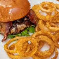 Caramelized Onion Burger · Hand crafted angus beef patty, with crispy bacon caramelized onion, Swiss cheese and lettuce...