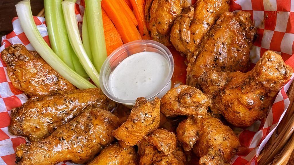 Wings 1/2 Doz · Cajun spiced wings fried for a delicious crisp. Served with celery, carrots, and ranch dipping sauce.