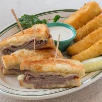 The Original Spires Beefeater Sandwich · Thinly sliced roast beef with melted Jack cheese on grilled parmesan cheese-bread. Served wi...