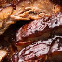 Bbq Ribs · Mouth-watering BBQ Ribs with your choice of 2 sides.