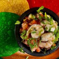 Ceviche · Shrimp onion, cucumber, jalapeño, avocado, cilantro, bloody mary mix tomato lime lemon.