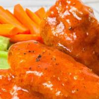 Mexican Wings · Crispy wings and drumettes buffalo sauce your choice: mild, spicy, fuego.