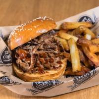South County Tri-Tip · 24 hour marinated tri-tip tossed in original BBQ sauce, and topped with crispy onions, on a ...