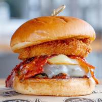 Brisket Burger · Ground brisket patty topped with brown sugar chili flake bacon, melted Provolone and Gouda c...