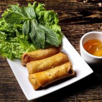 Combination Chicken And Shrimp Egg Rolls (Cha Gio) · Ground chicken and shrimp with taro root and carrots wrapped in wanton paper, fried to crisp...