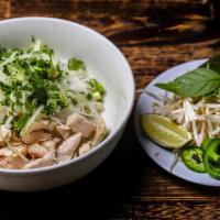 Pho Ga · Fragrant chicken broth with rice noodles and shredded slices of steamed chicken.