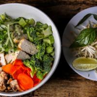 Vegetarian Pho · Rice noodles served in a fragrant vegetable broth with strips of tofu, black mushrooms and c...