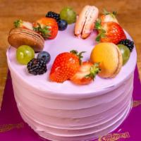 Taro Cake · Soft yellow sponge cake filled with a light and flavorful taro cream. Outside decorated with...