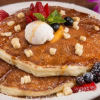Gluten-Free White Corn Pancakes · Our house-made gluten-free pancakes are made with organic,
local white corn, griddled to a g...