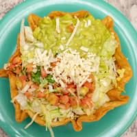 Taco Salad · Your choice of meat or vegetarian plus beans, rice, pico de gallo, cheese, guacamole, lettuc...