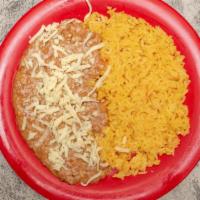 Rice And Beans · Half rice and Half  beans with cheese on the top