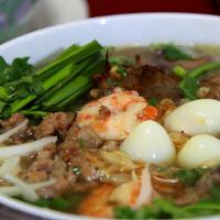 Hu Tieu Nam Vang (Seafood Soup) · Cambodian style noodle broth with assorted seafood and pork with clear noodle soup.