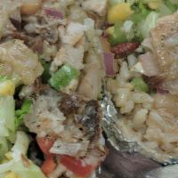 Sisig Burrito · Fried pork belly (sisig), garlic fried rice, beans, lettuce and pico de gallo.