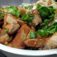 Chicken Teriyaki Bowl · Steam rice, side salad and chicken teriyaki topped with green salsa.