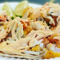 Fried Fish Taco · Fried fish, cole slaw, pico de gallo, sriracha mayo on a six inch tortilla.