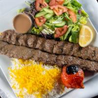 Beef Koobideh Kabob · Two skewers of our special beef and lamb blend, served with rice and grilled tomato.