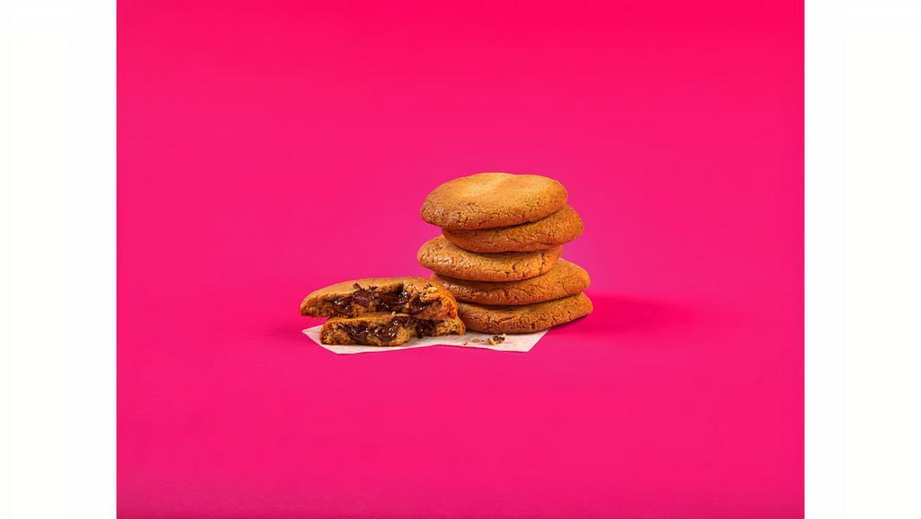 Warm Double Chocolate Stuffed Cookie · A giant, gooey, fresh-baked chocolate chip cookie stuffed with molten chocolate.