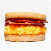 Ham, Egg & Cheese · Breakfast ham, scrambled eggs, sharp cheddar cheese & sauce of your choice on a toasted Engl...