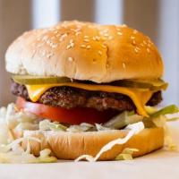 Burger · 1/4 lb beef patty on a brioche bun, with lettuce, onion, tomato, and pickle chips. Cheese an...