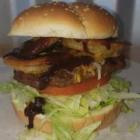 Bbq Burger · 1/4 lb beef patty on a brioche bun, with lettuce, tomato, onion, topped with shredded chedda...