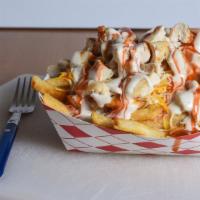Cheesy Buffalo Chicken Fries · 1 lb crispy baked fries, grilled chicken breast, with shredded cheddar cheese blend, ranch d...