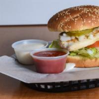 Buffalo Chicken Sandwich · 1/4lb grilled skinless breast on a brioche bun, with lettuce, tomato, onion, pickles and sid...