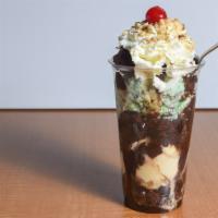 2 Scoops Brownie Bomb · Your favorite ice cream, triple chocolate brownie, topped with hot fudge, whipped cream, nut...