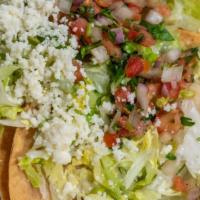 Tacos Dorados Especial(Each) · hard shell taco filled with Seasoned Mashed Potato topped with lettuce, pico de gallo, and c...